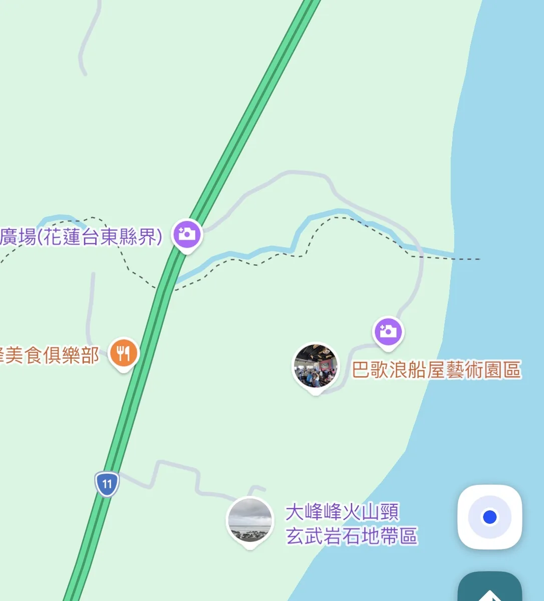 Google Maps standard view showing a coastal highway and smaller roads leading toward the shore